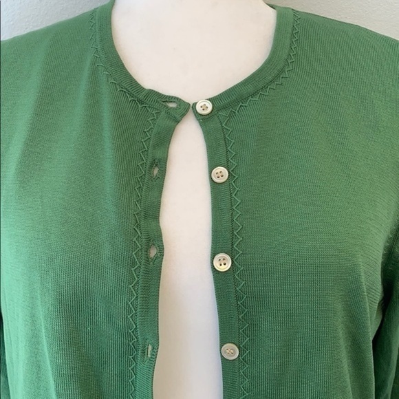 Orvis green button from cardigan sweater. - Picture 3 of 9
